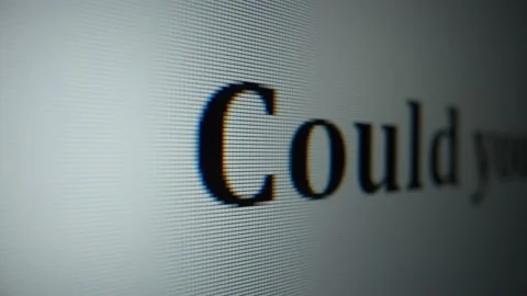 Could you repeat that please. Close-up text on monitor Vídeo Stock 231651602