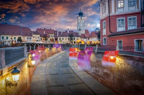 Council Tower in Sibiu at Sunset  Dramatic Sky with Orange Clouds and Blue .. Foto stock