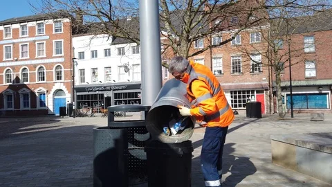 A council worker emptying a bin Stock Footage 105966543