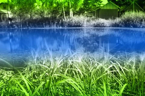 Counrtyside lake with dramatic reflections background 스톡 사진