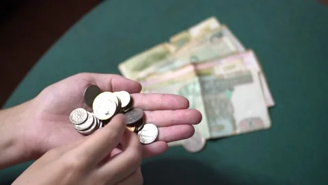 Count iron coins in hand Stock Footage 138868877