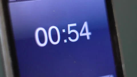 Countdown 1 minute on old iPhone 4K Vídeos de archivo 143870787