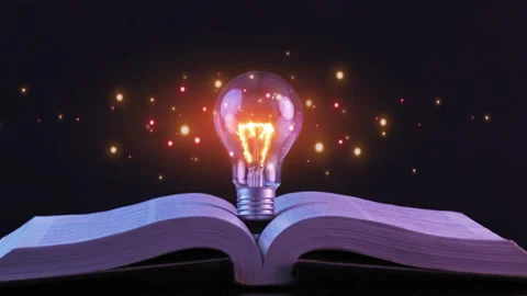 Countdown 10 seconds with fire numbers inside glowing light bulb on book. Stock Footage 254312632