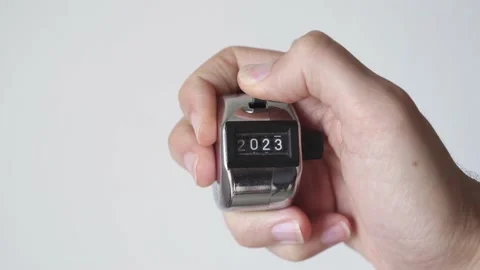 Countdown to 2023 concept. Hand with metal tally counter going from 2022 to 2023 Stock Footage 220520800