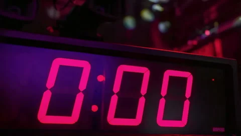 Countdown Clock Displaying Zero at a Vibrant Event in a Lively Environment Stock Footage 304168010