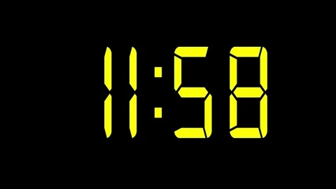 Countdown to midnight with a digital clock animation yellow color Stock Footage 298131200