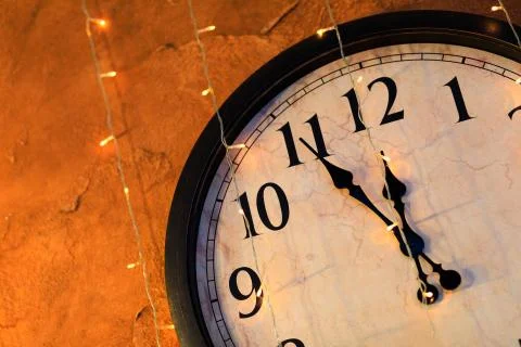 Countdown to midnight. Retro style clock counting last moments before Christm 库存照片