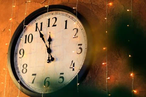 Countdown to midnight. Retro style clock counting last moments before Christm 库存照片