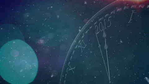 Countdown starting analog clock hands ticking toward 2015 with bokeh and Stock Footage 310729061