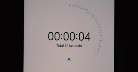 Countdown from ten seconds to zero on digital white display. Bright glowing Stock Footage 162686359