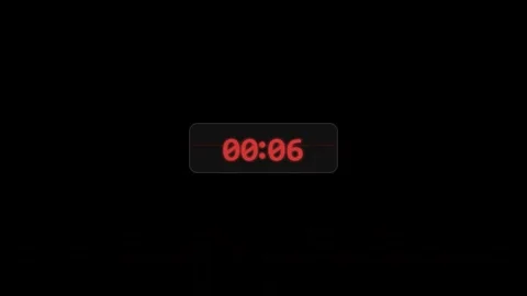 Countdown timer with glowing red digital numbers counting down 動画素材 346430910