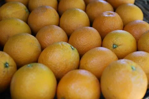 On the counter are oranges. Stock Photos