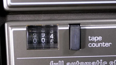 Counter of the Audio Cassette in the Tape Deck Recorder is Rotating Stockbeeldmateriaal 104040832