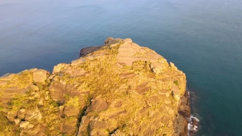 Counter-clockwise Aerial View of Tip of Yongmeori (Dragon's Head) Coast, Jeju. Stock Footage 146067793