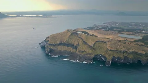 Counter-clockwise Aerial View of Udo Island with Seonsan Sunrise Peak in View. Stock Footage 146067511