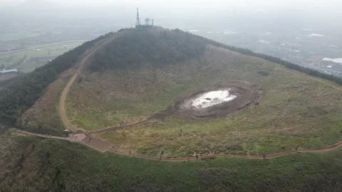 Counter-clockwise Dolly-in Aerial View of the Crater, Geum Oreum, Jeju, Stock Footage 146066761