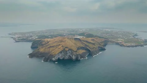 Counter-clockwise Dolly-in Aerial View of Udo Island, Jeju Volcanic Island. Stock Footage 146067354