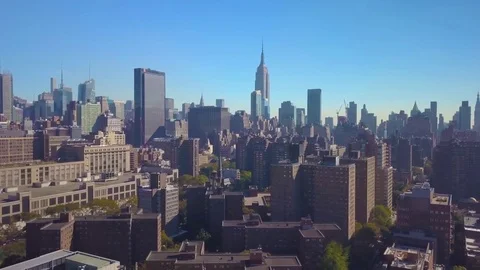 Counter clockwise orbiting Empire State Building flying over Manhattan Stock Footage 81659638