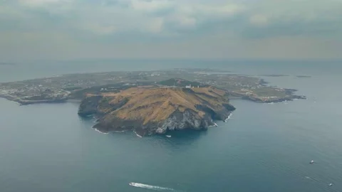 Counter-clockwise Wide Aerial View of Entire Udo Island, Jeju Volcanic Island. A Stock Footage 146067347