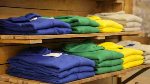 Counter with colourful sweaters timelapse Stock Footage 67609594