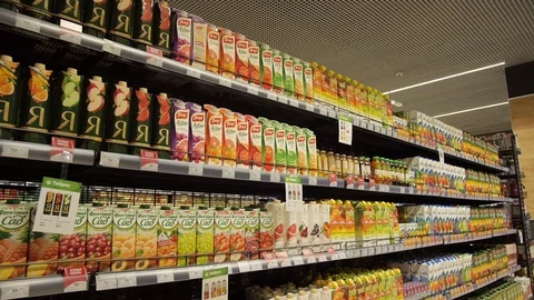 Counter with different types of juice, fruit juice Stock Footage 75256152