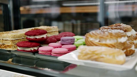 Counter full of delicious buns and pastries in a shop, bakery Stock Footage 234766868