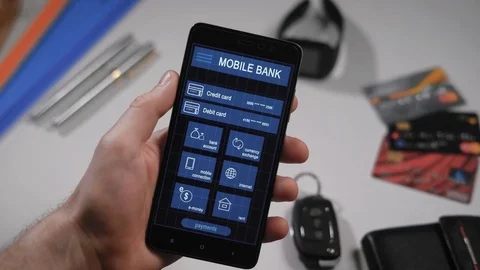 Counter payment via mobile banking application on the smartphone. A man Stock Footage