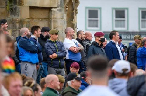 Counter protesters stand guard at the base of The Obelisk in The Marketplace  Stock Photos