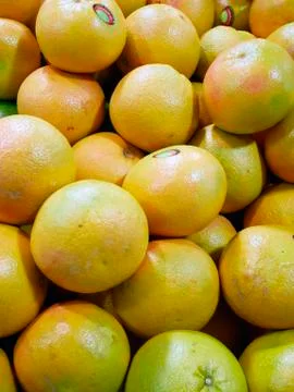 Counter with red grapefruits Stock Photos