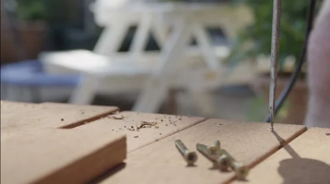Counter sinking a hole in wood in slow motion Stock Footage 46692467