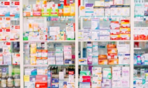 Counter store table pharmacy background shelf blurred blur focus drug medical Foto stock