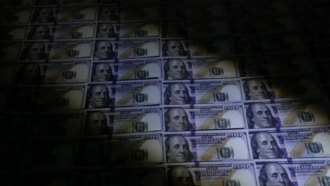 Counterfeit money checking with ultraviolet lamp. Dollar currency notes. Stock Footage 153308614
