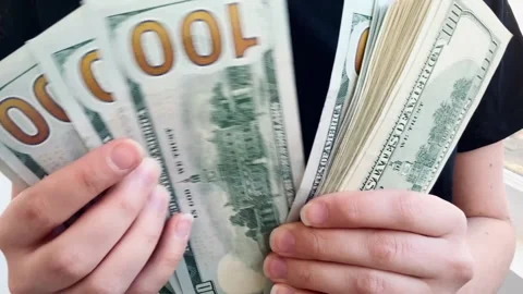 Counting 100 dollar bills, stack of dollars Stock Footage 304634733