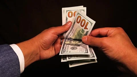 Counting $1,000 in $100 Bills Using the Bill Flipping Method Stock Footage 297744486
