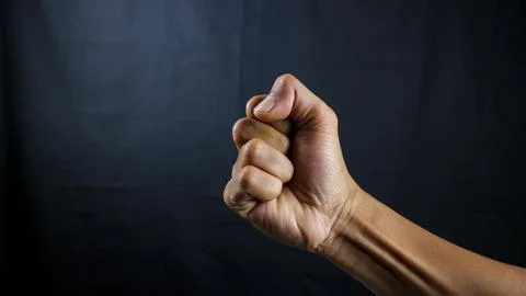 Counting, aggression, brave concept. Black male fist, clenched hand, strong.. Stock Photos