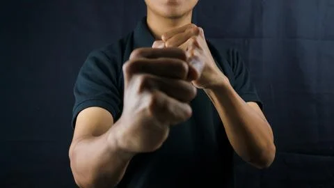 Counting, aggression, brave concept. Black male fist, clenched hand, strong.. Stock Photos