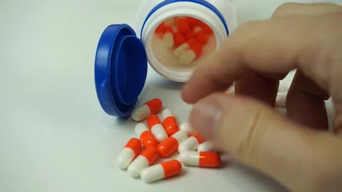 Counting and checking  capsules Stock Footage 203966621