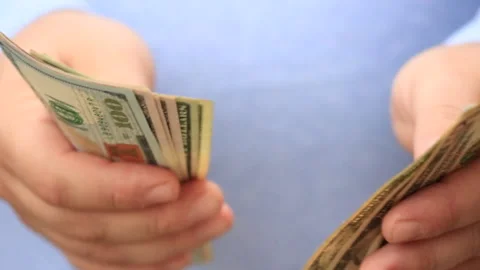 Counting and showing US Dollar money. Counting USD banknotes 6 Stock Footage 172099378