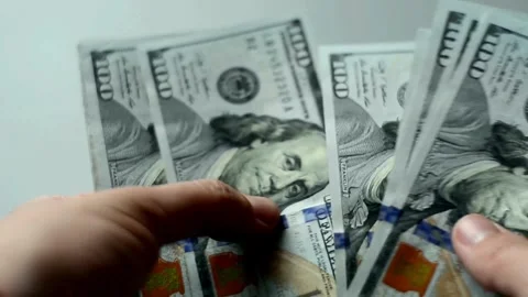 Counting a bundle of dollar paper money. The concept of earnings and business Stock-Footage 336262130