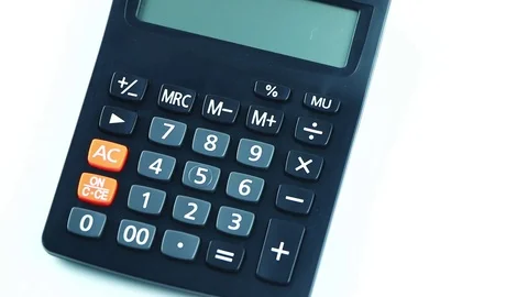 Counting on calculator. Finger presses the button calculator. Closeup. Stock Footage 85027189