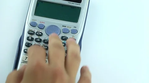 Counting on calculator. Finger presses the button calculator. Closeup. Stock Footage 85564574