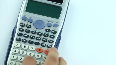 Counting on calculator. Finger presses the button calculator. Closeup. Stock Footage 87260996