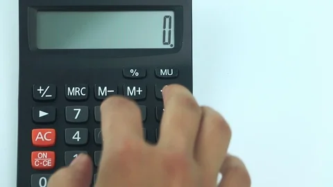 Counting on calculator. Finger presses the button calculator. Closeup. Stock Footage 88705894