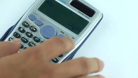 Counting on calculator. Finger presses the button calculator. Closeup. Stock Footage 88706031