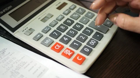 Counting on calculator. Stock Footage 119172691