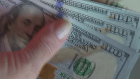 Counting Cash  Close-Up of Hands with US Dollar Banknotes in Slow Motion Stock Footage 323702383