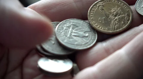 Counting coins in hand Stock Footage 55768188