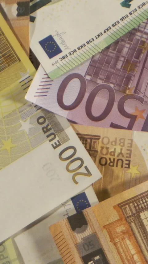 Counting currency notes in euros on a table 動画素材 339303598
