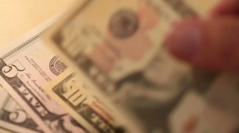 Counting Dollar bills on desk Stock Footage 41998878