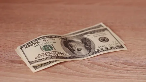 Counting dollars and taking it back Stock-Footage 83950105